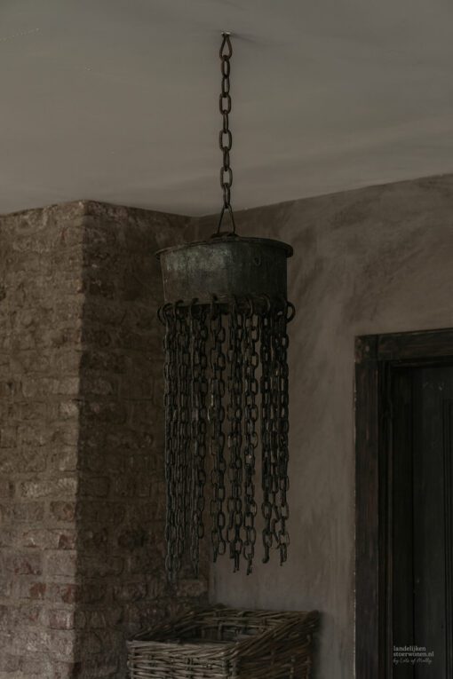 Hanglamp van oude melkbusdeksel